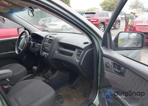 2007 Kia Sportage Lx from USA, damaged, VIN KNDJF724577389988